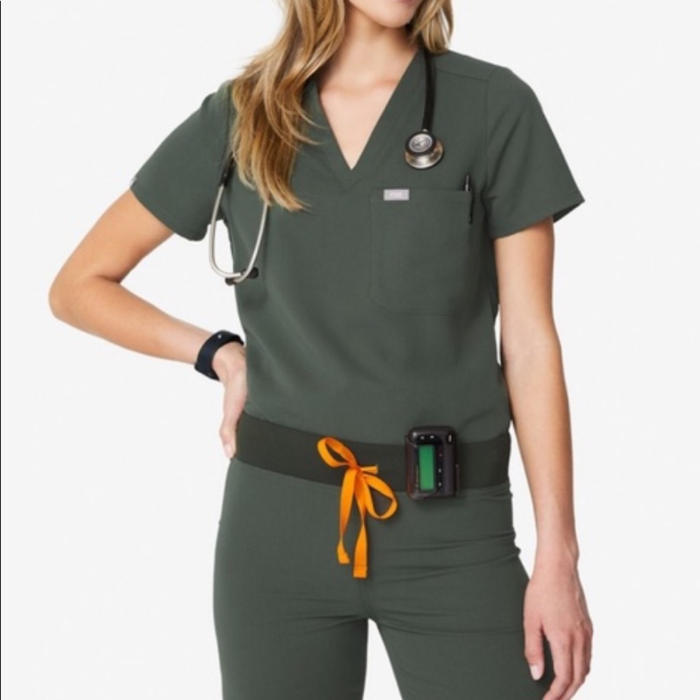 Wear figs scrubs in Moss Green